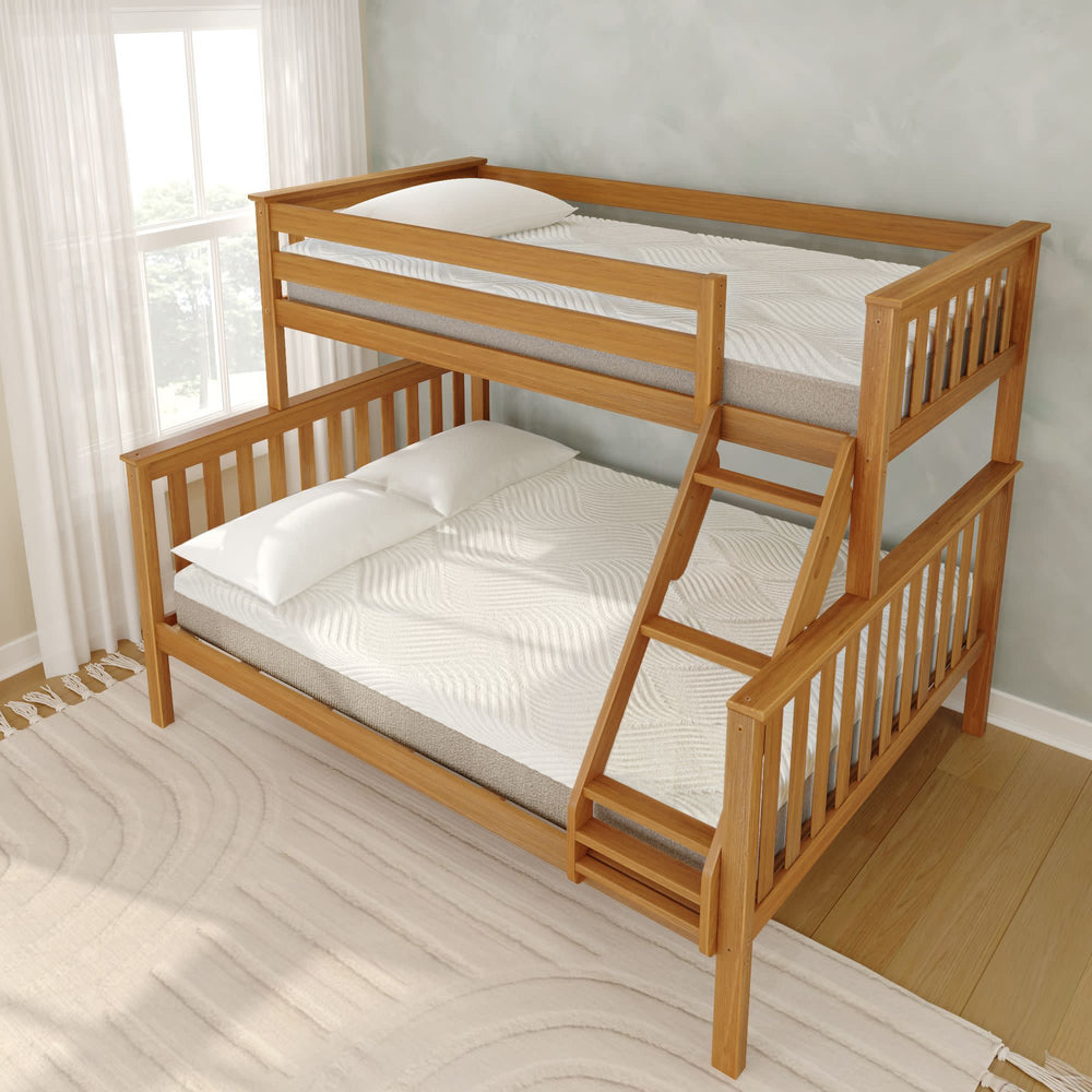 Wooden bunk bed with twin over full design in a bright bedroom setting.