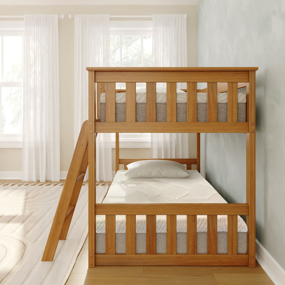 Wooden bunk bed in a bright bedroom with natural light streaming through sheer white curtains.
