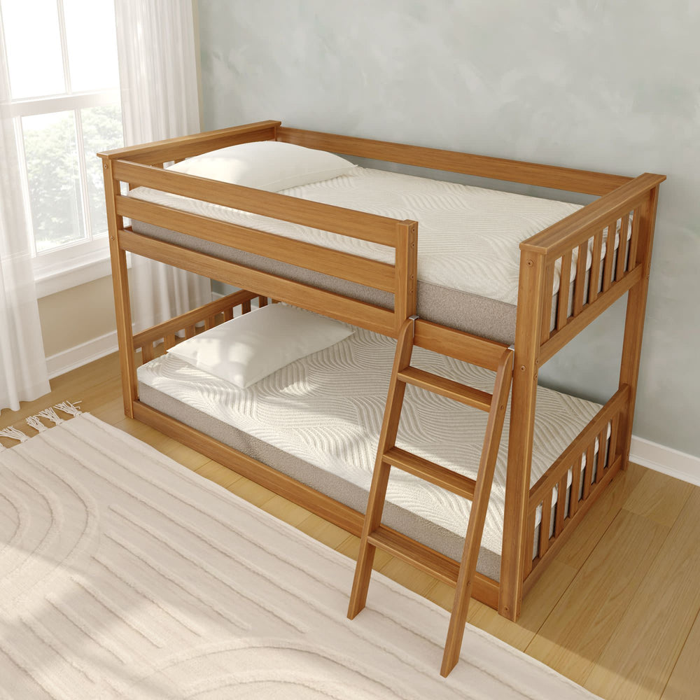 Wooden bunk bed with natural finish and white mattresses in a modern bedroom.