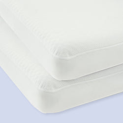 Two white twin mattresses stacked on a light blue background, showcasing comfort and quality bedding options.