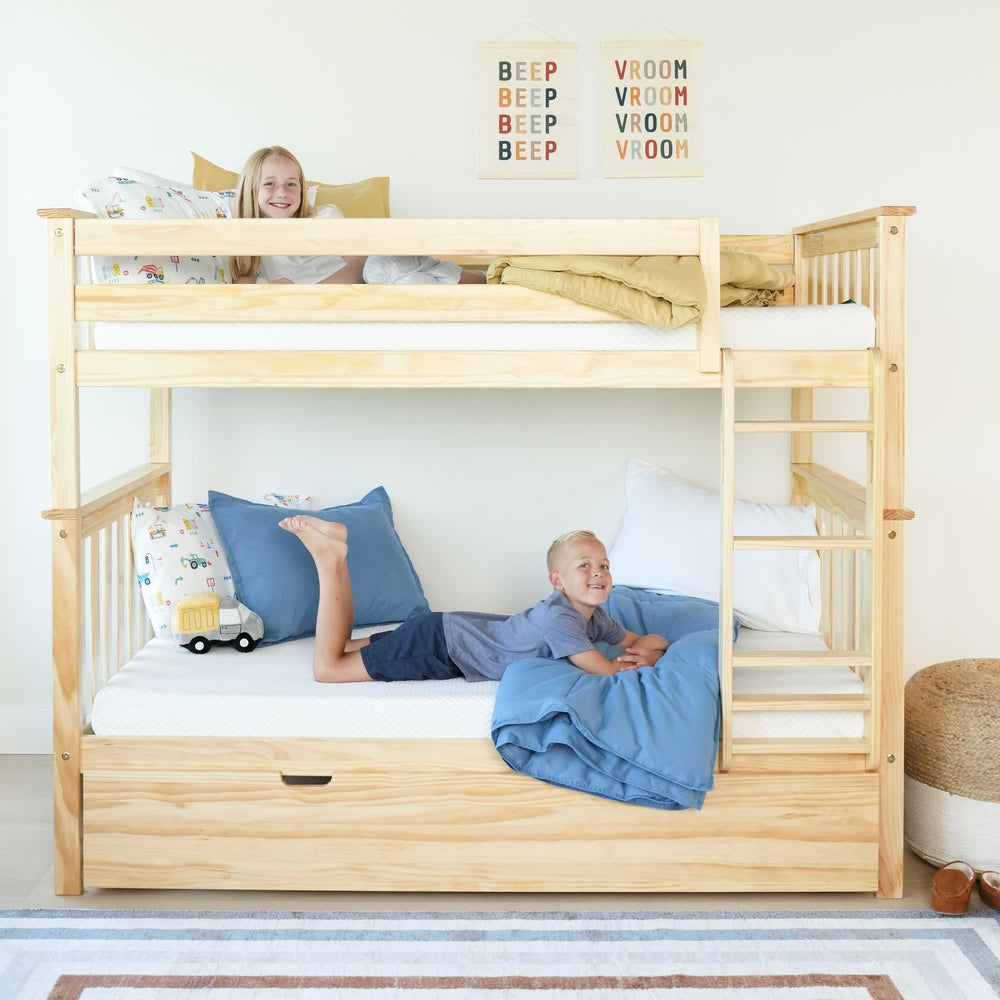 Children enjoying a wooden bunk bed with colorful bedding and playful room decor.
